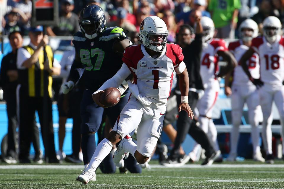 Kyler Murray #1 of the Arizona Cardinals runs against the Seattle Seahawks during the third quarter at Lumen Field on October 16, 2022, in Seattle, Washington.