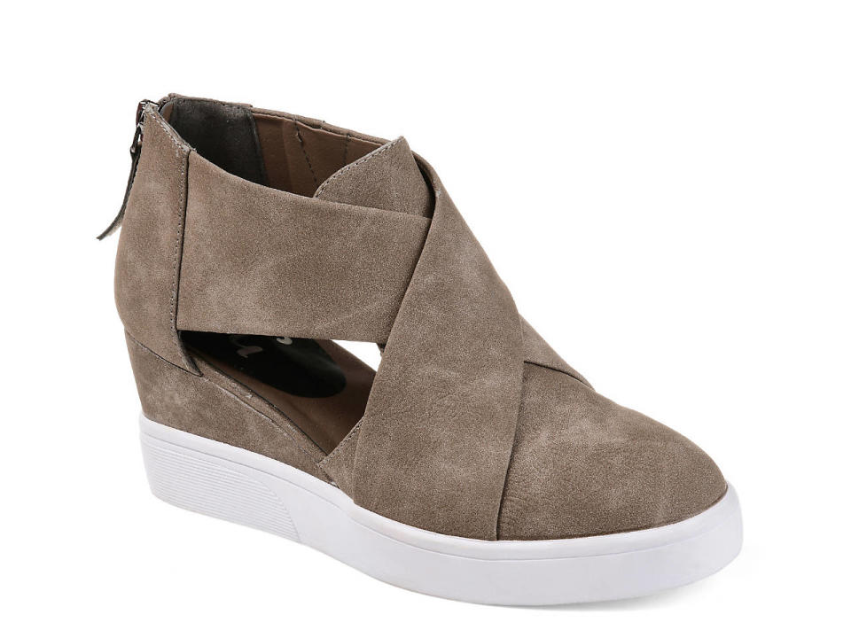 <p><a href="https://go.redirectingat.com?id=74968X1596630&url=https%3A%2F%2Fwww.dsw.com%2Fen%2Fus%2Fproduct%2Fjournee-collection-seena-wedge-sneaker%2F435736&sref=https%3A%2F%2Fwww.thepioneerwoman.com%2Ffashion-style%2Fg32463219%2Fcomfortable-wedges%2F" rel="nofollow noopener" target="_blank" data-ylk="slk:Shop Now;elm:context_link;itc:0;sec:content-canvas" class="link ">Shop Now</a></p><p>Journee Collection Seena Wedge Sneaker </p><p>dsw.com</p><p>$59.99</p><span class="copyright">DSW</span>