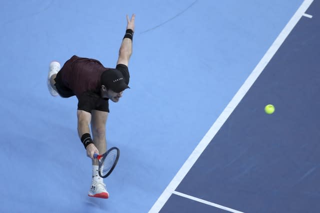 Andy Murray lunges for a forehand