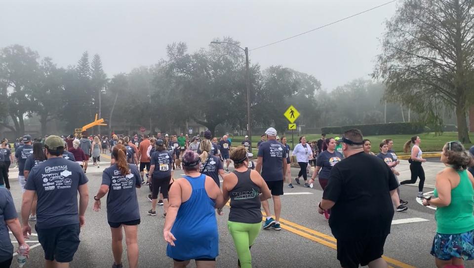 People donated canned goods and participated in the 5K Thursday morning.