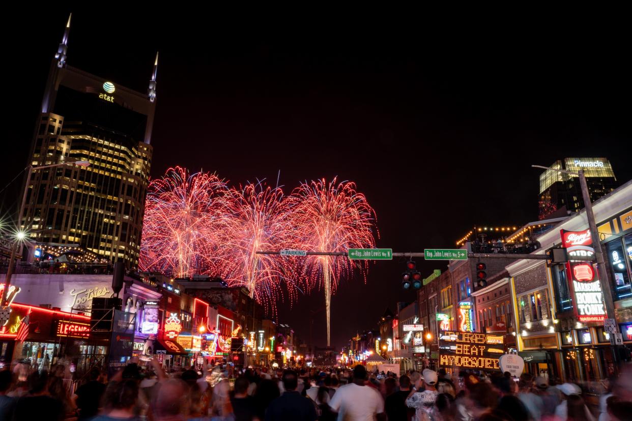 Fireworks light up the sky over Lower Broadway during the Let Freedom Sing! Music City July 4th event in Nashville, Tenn., Tuesday, July 4, 2023.