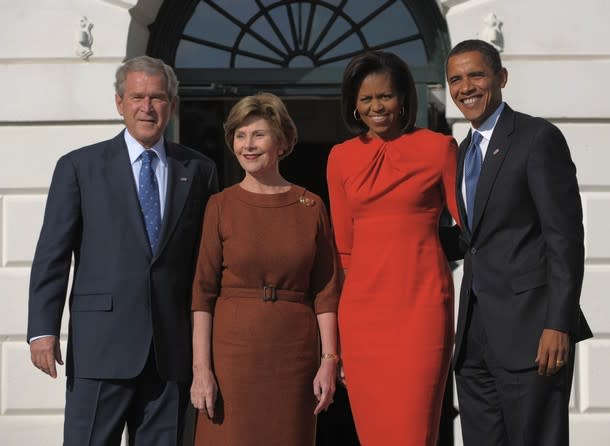 The "Redemption Dress": After her questionable inaugural night outfit, Obama returned to favorite designer Pinto and wore this regal red silk number to visit the White House.