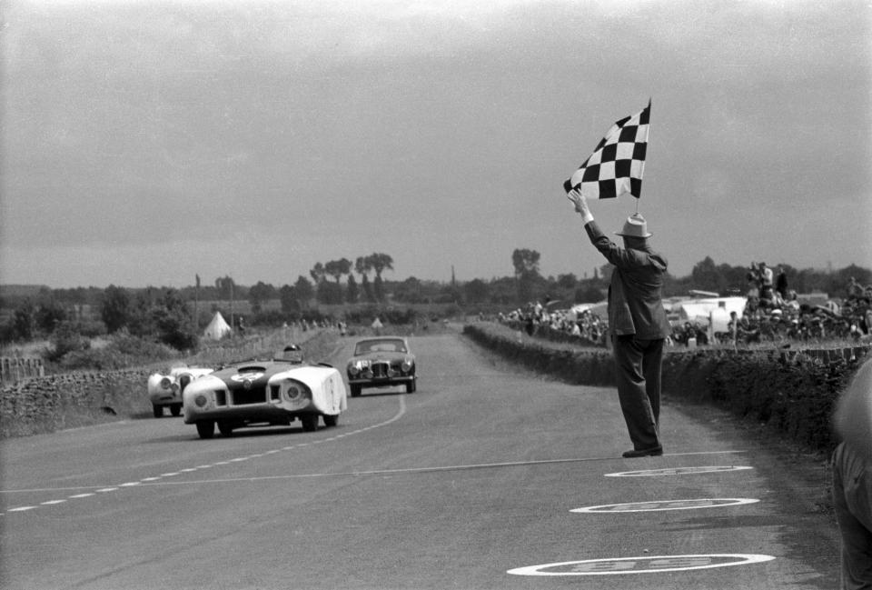 The 24 Hours of Le Mans; Le Mans, June 24-25, 1950. Le Monstre, the Cunningham Cadillac special, makes the finsih, ahead of a Jaguar and an Aston Martin. (Photo by Klemantaski Collection/Getty Images)