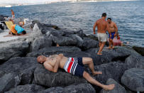 <p>Men relax in the hot weather by the Marmara Sea in Istanbul, Turkey, Aug. 3, 2018. (Photo: Murad Sezer/Reuters) </p>