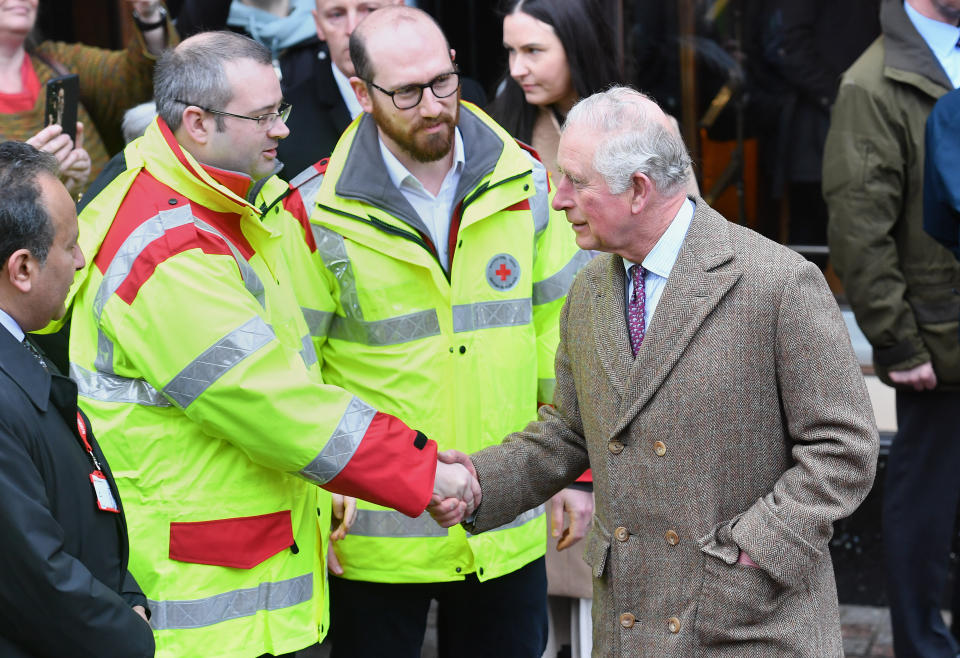 The Prince of Wales meeting first responders during a visit to Pontypridd, Wales, which has suffered from severe flooding in the wake of Storm Dennis.