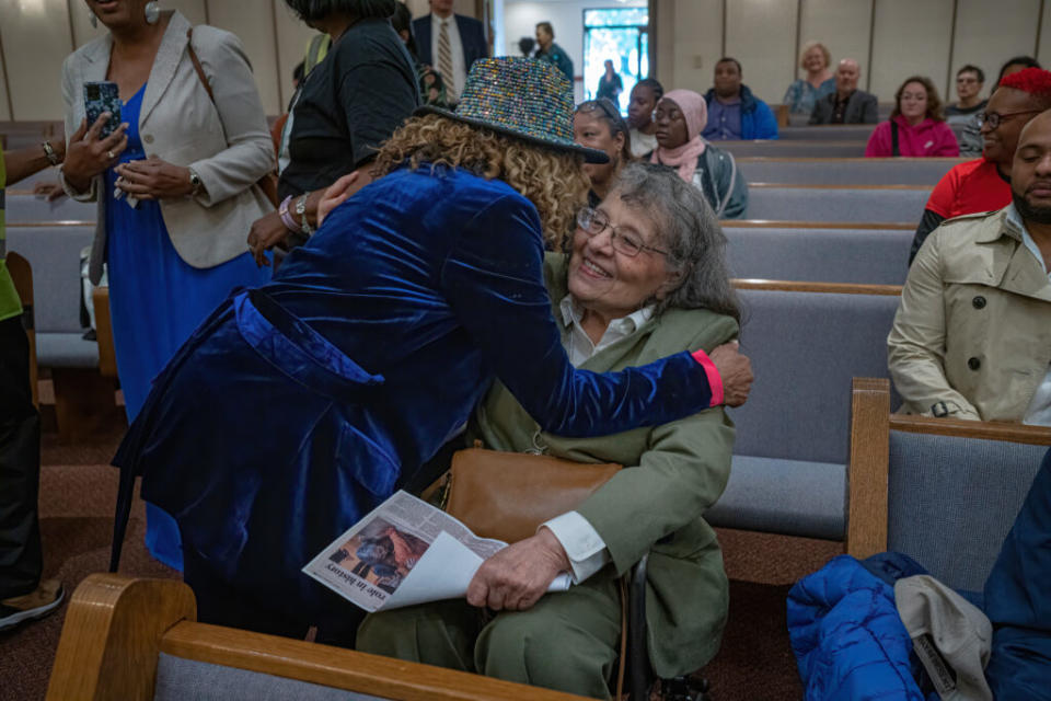 Frankie Henry, who as a Tennessee State University student was recruited by Diane Nash to participate in Nashville lunch counter sit-ins, hugs Nash Saturday at First Baptist Church Capitol Hill. (Photo: John Partipilo)