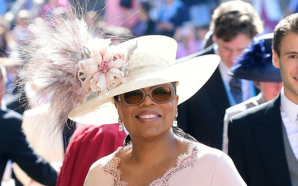 Oprah Winfrey arrives for the wedding ceremony of Prince Harry and Meghan in 2018 - Ian West/AFP