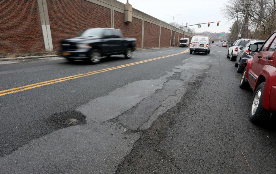 Patches of potholes are pictured along the heavily traveled Midland Avenue Avenue in Yonkers, Jan 25, 2022. 