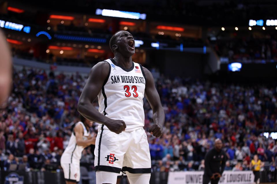 San Diego State forward Aguek Arop celebrates after the Aztecs beat the Creighton Bluejays to reach the program's first Final Four.