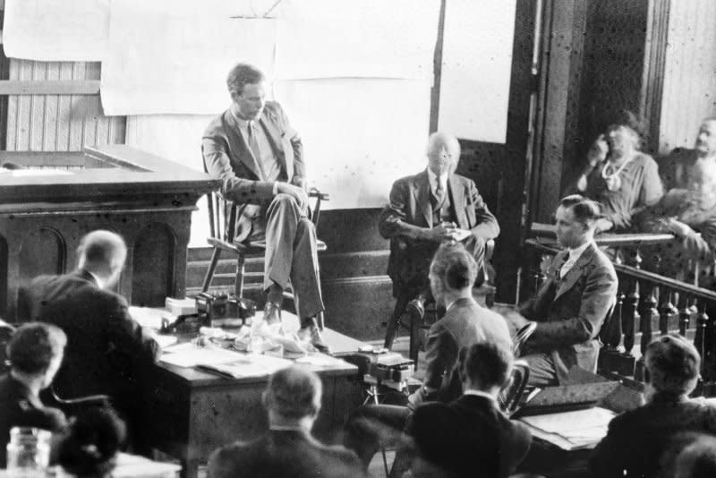 Charles Lindbergh is shown on the witness stand in the courtroom at Flemington as he told his dramatic story of the night of March 1, 1932, when his young son was kidnapped. On April 2, 1932, Lindbergh left $50,000 in a New York City cemetery for the return of his kidnapped son. The child was later found dead. File Photo by Library of Congress/UPI