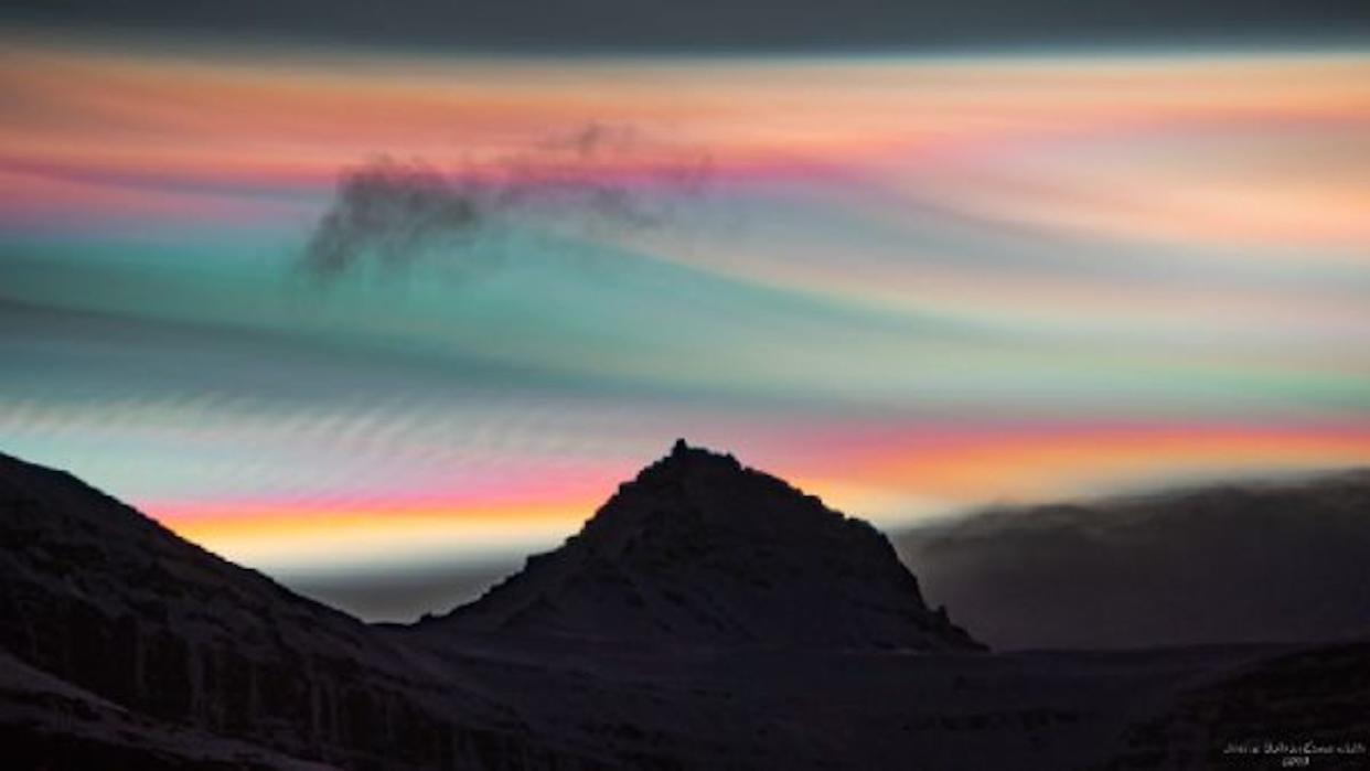  Bright multi-colored clouds shining in the night sky above Mount Jökultindur in Iceland on Jan. 25. 