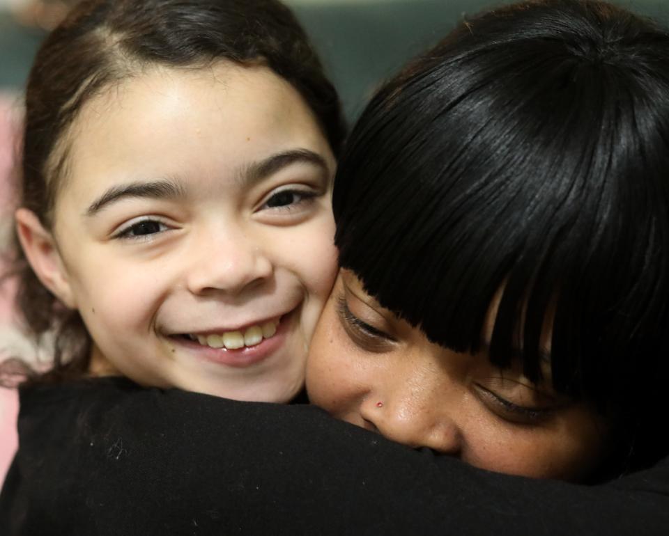 Kendra Smith embraces her daughter Diamond Yeno at their home in City of Poughkeepsie on January 28, 2021. Kendra's life has been deeply impacted by gun violence and loss, but she has overcome her challenges and works every day to protect her daughter from experiencing similar loss. 