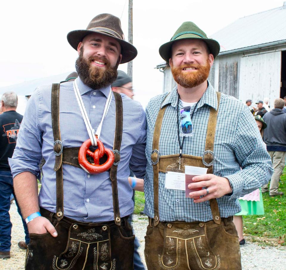 Tim Blattner and Tyler Chapman enjoy the festivities of a year's previous Oktoberfest dressed in traditional German attire.