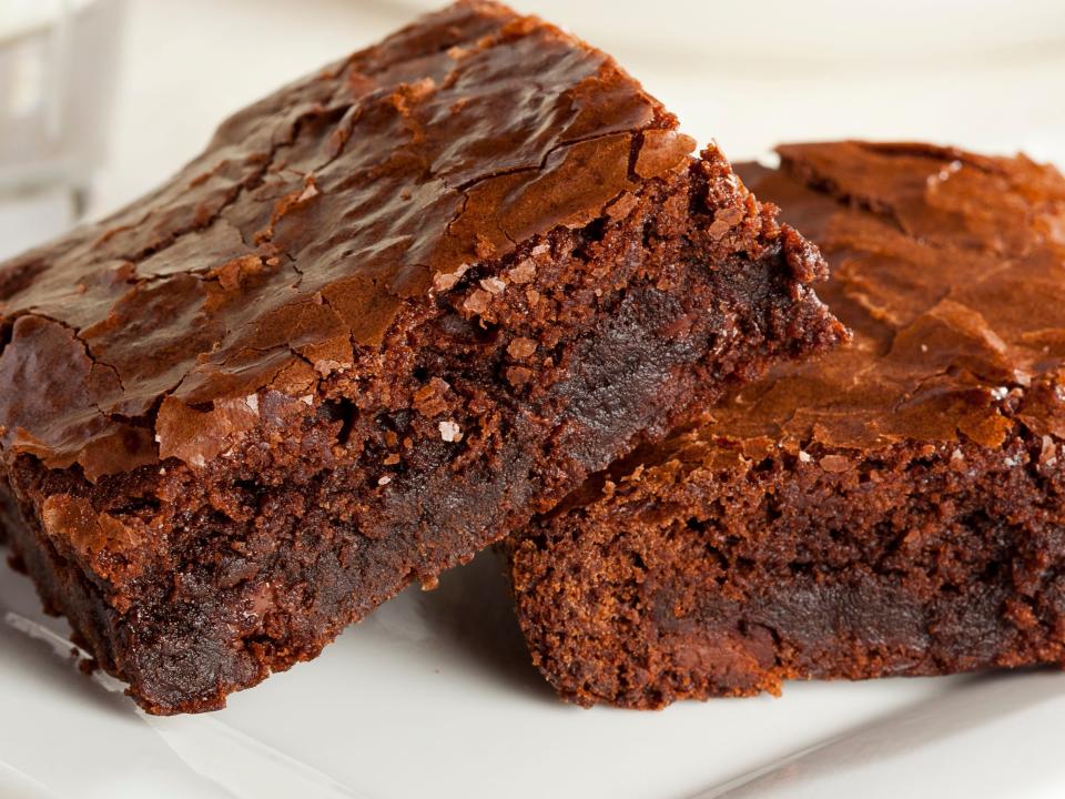 brownie squares on a white plate