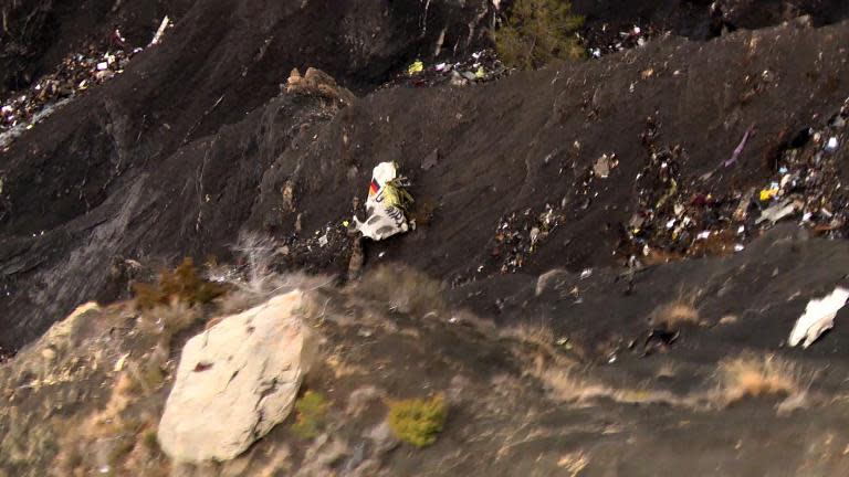 Debris from the Germanwings Airbus A320 is seen strewn over the crash site in the French Alps above the southeastern town of Seyne-les-Alps