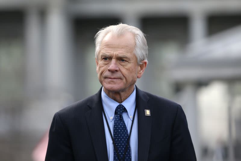 White House trade adviser Peter Navarro listens to a news conference outside of the West Wing of the White House