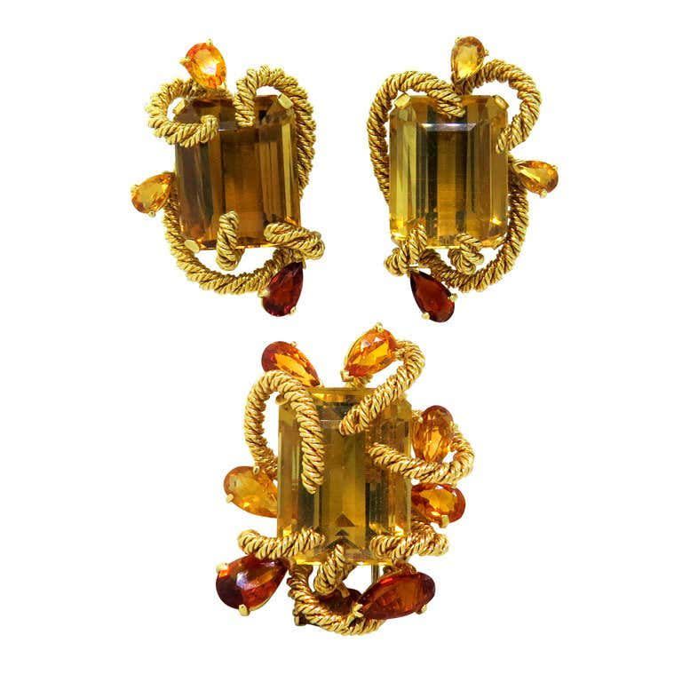 <p><strong>David Webb</strong></p><p>1stdibs.com</p><p><a href="https://www.1stdibs.com/jewelry/earrings/more-earrings/rare-original-1960s-david-webb-gem-set-earrings-brooch-set/id-j_178252/" rel="nofollow noopener" target="_blank" data-ylk="slk:Discover;elm:context_link;itc:0;sec:content-canvas" class="link ">Discover</a></p><p>Created by the famed New York jeweler <a href="https://www.davidwebb.com" rel="nofollow noopener" target="_blank" data-ylk="slk:David Webb;elm:context_link;itc:0;sec:content-canvas" class="link ">David Webb</a> during the 1960s, these citrine-centered earrings and brooch are representative of the house's forward-thinking and boundary-pushing style. </p>