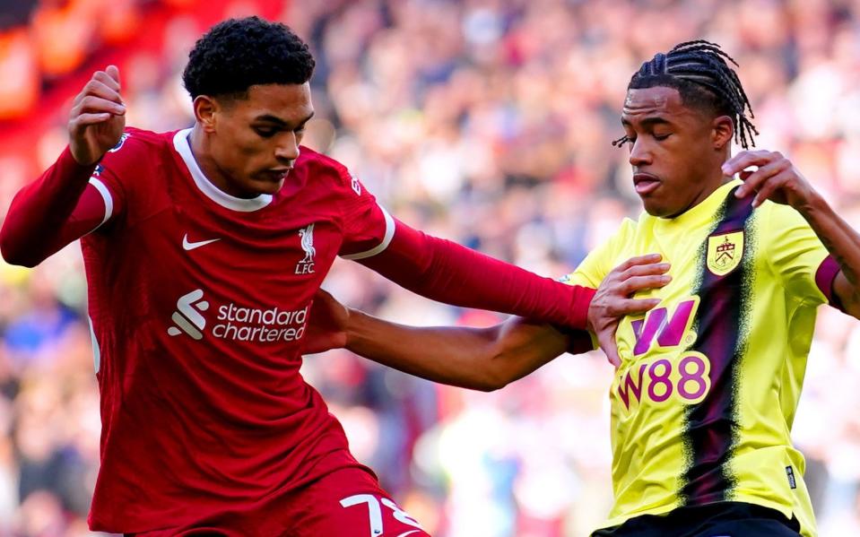 Jarell Quansah from Liverpool and Wilson Odobert Burnley battle for the ball