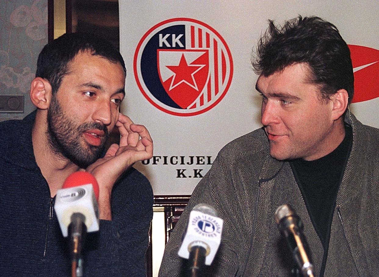 NBA stars Vlade Divac (Charlotte Hornets) and Arvydas Sabonis (Portland Trail Blazers) chat during news conference in Belgrade January 6. Divac and Sabonis have joined players fleeing the NBA lockout. Divac signed up with Yugoslav champions Crvena Zvezda (Red Star) Belgrade, and Sabonis with Zhalgiris Kaunas, who play in the Euroleague in Belgrade on January 7.

IM/