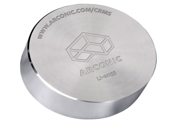 Cylinder of fabricated silver-colored metal with Arconic logo on it.