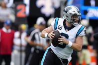 Carolina Panthers quarterback Baker Mayfield (6) sets back to throw during the first half of an NFL football game against the New Orleans Saints, Sunday, Sept. 25, 2022, in Charlotte, N.C. (AP Photo/Jacob Kupferman)