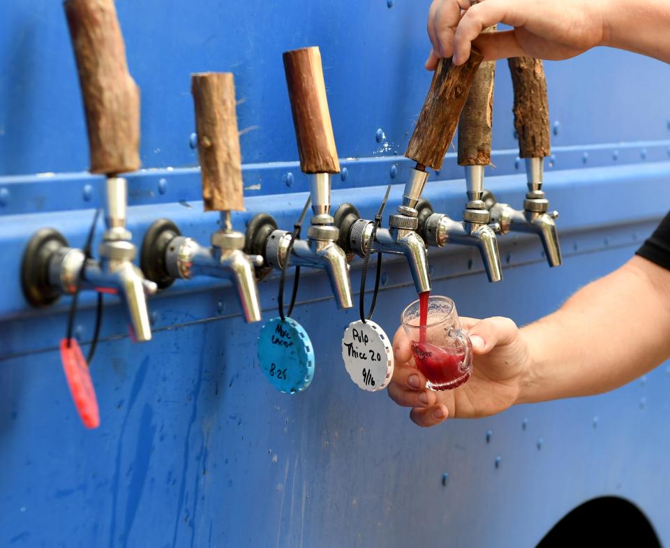 Carft beer from Burley Oak Brewing Company is poured at the Good Beer Festival Saturday, Oct. 9, 2021, at Pemberton Park in Salisbury, Maryland. The two day craft beer festival offered local beers, music, games and food,