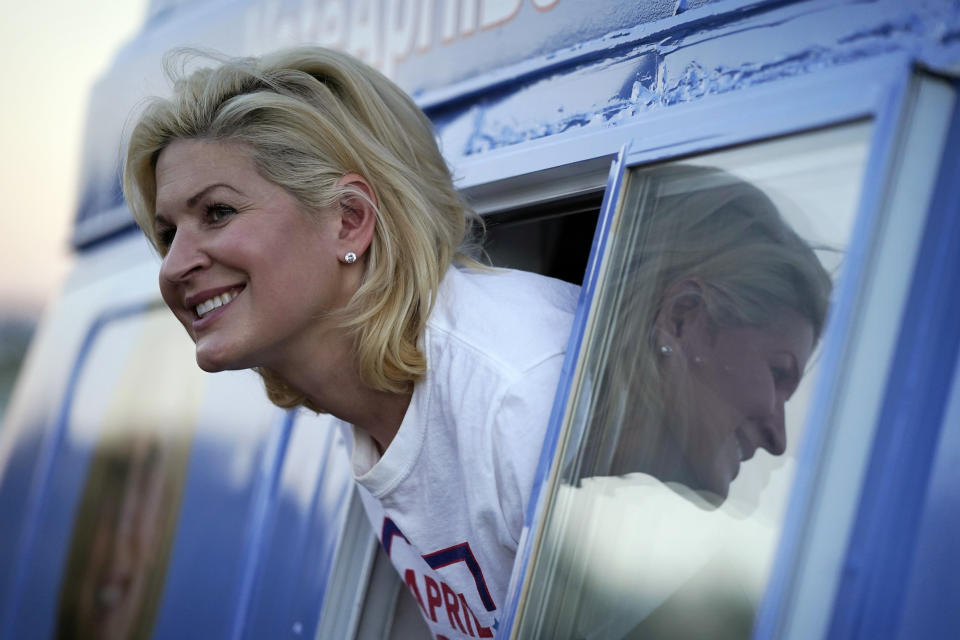 FILE - Republican April Becker campaigns from a converted ice cream truck Oct. 15, 2020, in Las Vegas. In the Nevada 3rd Congressional District that runs through the Vegas suburb of Henderson all the way to the Arizona border, the nonpartisan Cook Political Report is among those that consider Rep. Susie Lee's race against Becker a toss-up. (AP Photo/John Locher, File)