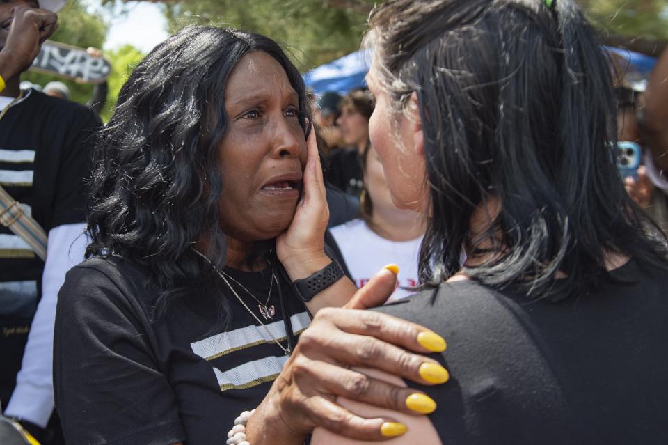 Sacramento City Councilwoman Lisa Kaplan, right, consoles Tyre Nichols' mother RowVaughn Wells, left, at the ribbon cutting celebration for the Tyre Nichols Skate Park, named in honor of the former Sacramento resident who was fatally beaten by Memphis police officers following a traffic stop in January, on Sunday, June 11, 2023, at Regency Community Park in Sacramento. "This is a very bittersweet thing for me," said Wells. "For this to be happening right now in Tyre's honor is a blessing." (Sara Nevis/The Sacramento Bee via AP)