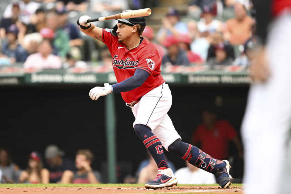 Cleveland Guardians' Josh Naylor hits an RBI single during the first inning of a baseball game against the Kansas City Royals, Saturday, July 8, 2023, in Cleveland. (AP Photo/Nick Cammett)