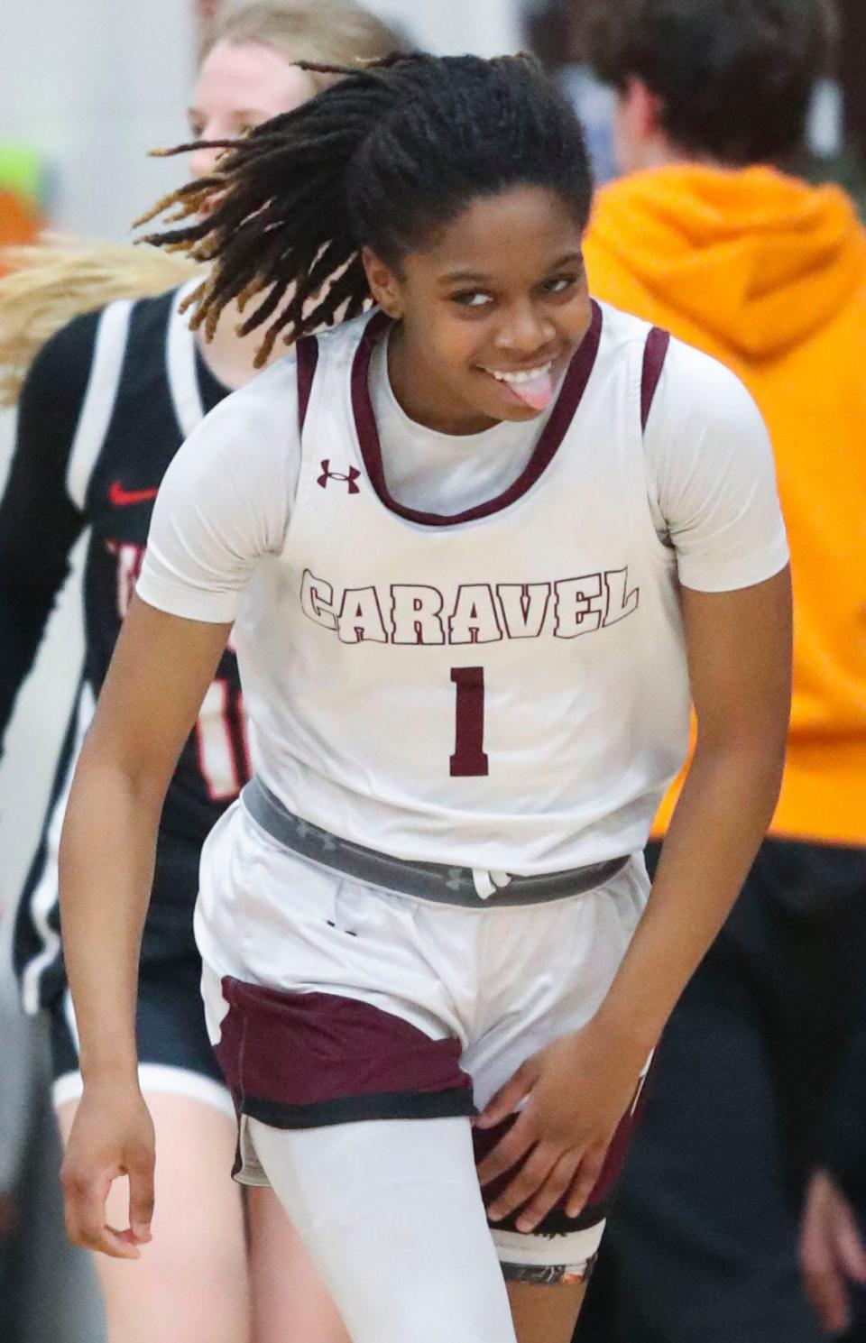 Caravel's Chastity Wilson heads back on defense after hitting a three-pointer in the second half of the Bucs' 67-63 win at Caravel Academy, Thursday, Feb. 8, 2024.