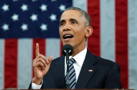 U.S. President Barack Obama emphasizes a point while delivering his final State of the Union address to a joint session of Congress in Washington January 12, 2016. REUTERS/Evan Vucci/Pool