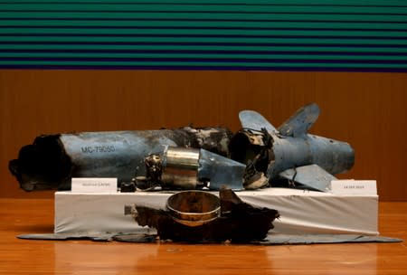 FILE PHOTO: Remains of the missiles which Saudi government says were used to attack an Aramco oil facility, are displayed during a news conference in Riyadh