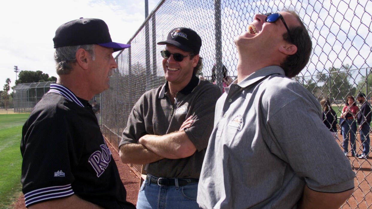 From left to right, Colorado Rockies head coach, Jim Leyland, talks with Rockies owners Charles and Richard Monfort Friday morning at spring training camp in Tucson.