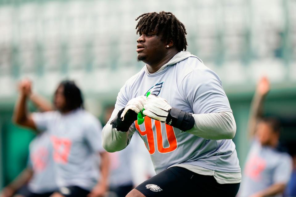 Philadelphia Eagles' Jordan Davis warms up at the NFL football team's practice facility in Philadelphia, Friday, June 3, 2022. (AP Photo/Matt Rourke)