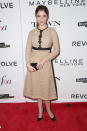 <p>The Pitch Perfect 2 star presented the award for Fashion Magazine of the Year to Elle Magazine’s editor in chief Robbie Myers. The actress wore a nude, tea-length lace dress with black details, paired with black pumps and a small box clutch—a mature look for the 30 year old star. <br></p><p><br></p>