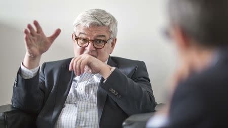 Former German foreign minister Joschka Fischer gestures during an interview with Reuters in Berlin October 13, 2014. REUTERS/Hannibal