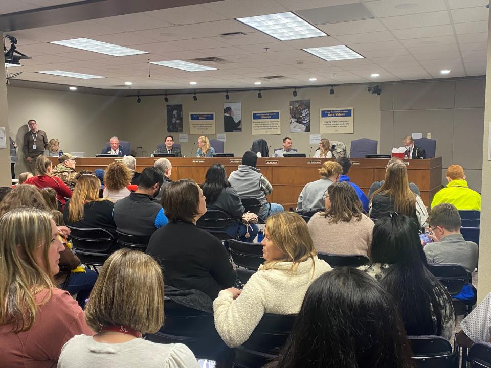 The Perry Township school board meets to vote on a proposal that would create new boundary lines for its 11 elementary schools and also stop its elementary choice program at the Perry Township school district officers on Dec. 12, 2022.
