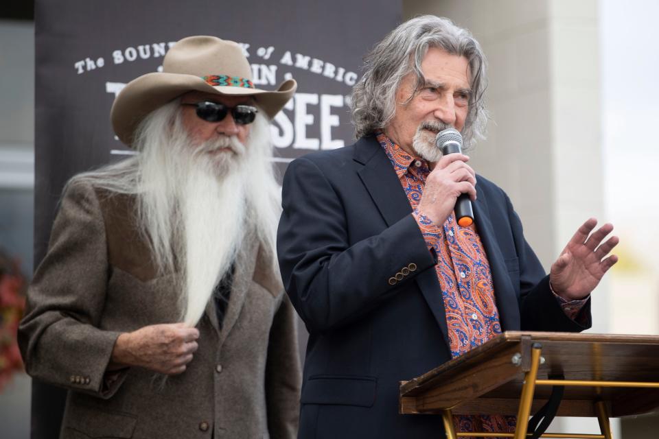 Richard Sterban, right, and William Lee Golden of the Oak Ridge Boys talk about the importance of their group's connections to Oak Ridge, Tenn. during a ceremony outside of the Grove Theater on Monday, November 20, 2023.