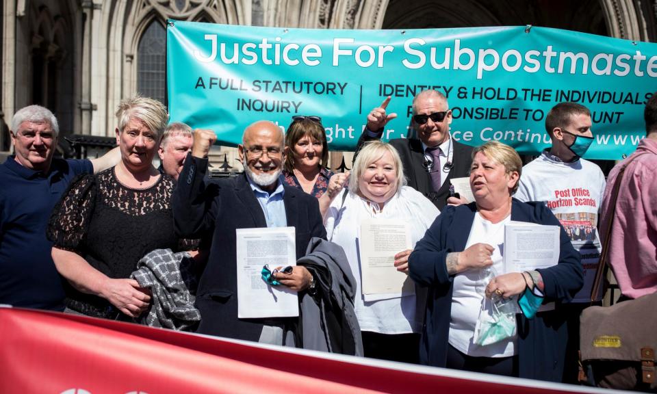 <span>Campaigners for post officer operators at the Royal Courts of Justice in April 2021.</span><span>Photograph: Alicia Canter/The Guardian</span>