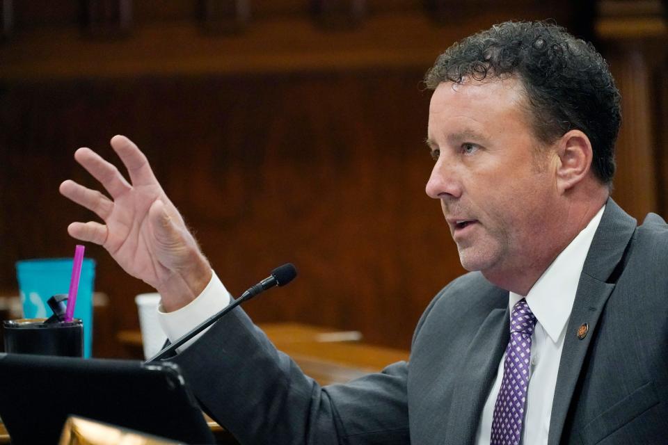 Sen. David Parker, R-Olive Branch, asks a question of Mississippi State Economist Corey Miller, unseen, during a joint legislative tax study committee hearing at the Capitol in Jackson, Miss., Wednesday, Aug. 25, 2021. Lawmakers are holding two days of hearings on eliminating or cutting Mississippi's individual income tax. (AP Photo/Rogelio V. Solis)