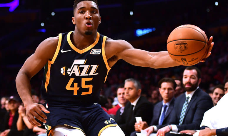 Donovan Mitchell with the basketball in his left hand.