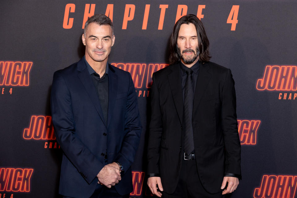 PARIS, FRANCE - MARCH 10: (L-R) Chad Stahelski and Keanu Reeves attend the 