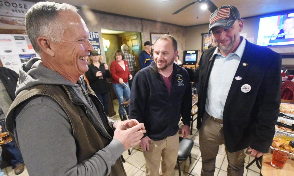 Retiring state Rep. Curt Sonney, at left, of Harborcreek, R-4th Dist., talks with Erie County Executive Brenton Davis, center, and Jake Banta, at right, who won the midterm election to fill Sonney's seat, during a gathering of Banta's supporters at the Wagon Wheel in Waterford on Nov. 8, 2022.