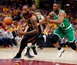 May 19, 2018; Cleveland, OH, USA; Cleveland Cavaliers forward LeBron James (23) drives to the basket in front of Boston Celtics forward Semi Ojeleye (37) during the first half in game three of the Eastern conference finals of the 2018 NBA Playoffs at Quicken Loans Arena. Mandatory Credit: Rick Osentoski-USA TODAY Sports