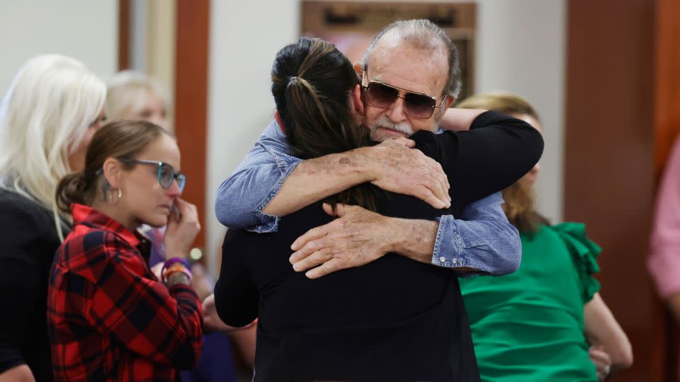 Larry Woodcock, JJ Vallow's grandfather, gets a hug after the verdict in the Chad Daybell murder trial was read at the Ada County Courthouse in Boise, Idaho, on Thursday. - Kyle Green/AP