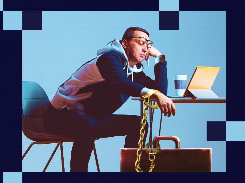 Tech bro appearing disinterested while working in an office setting, with a chain linking their hand and briefcase.