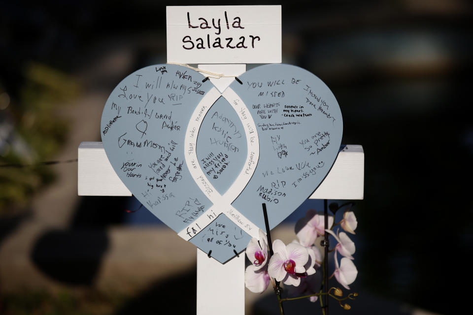 Layla Salazar's cross stands at a memorial site for the victims killed in this week's shooting at Robb Elementary School in Uvalde, Texas, Friday, May 27, 2022. (AP Photo/Dario Lopez-Mills)