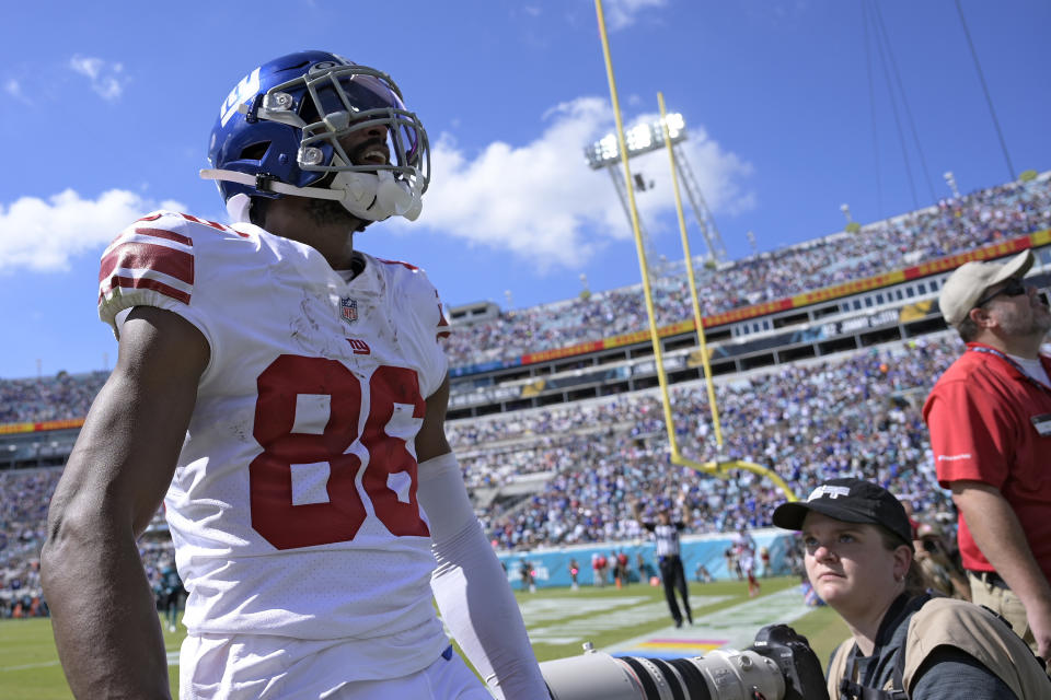 New York Giants wide receiver Darius Slayton (86) celebrates after scoring on a 32-yard touchdown reception against the Jacksonville Jaguars during the first half of an NFL football game Sunday, Oct. 23, 2022, in Jacksonville, Fla. (AP Photo/Phelan M. Ebenhack)