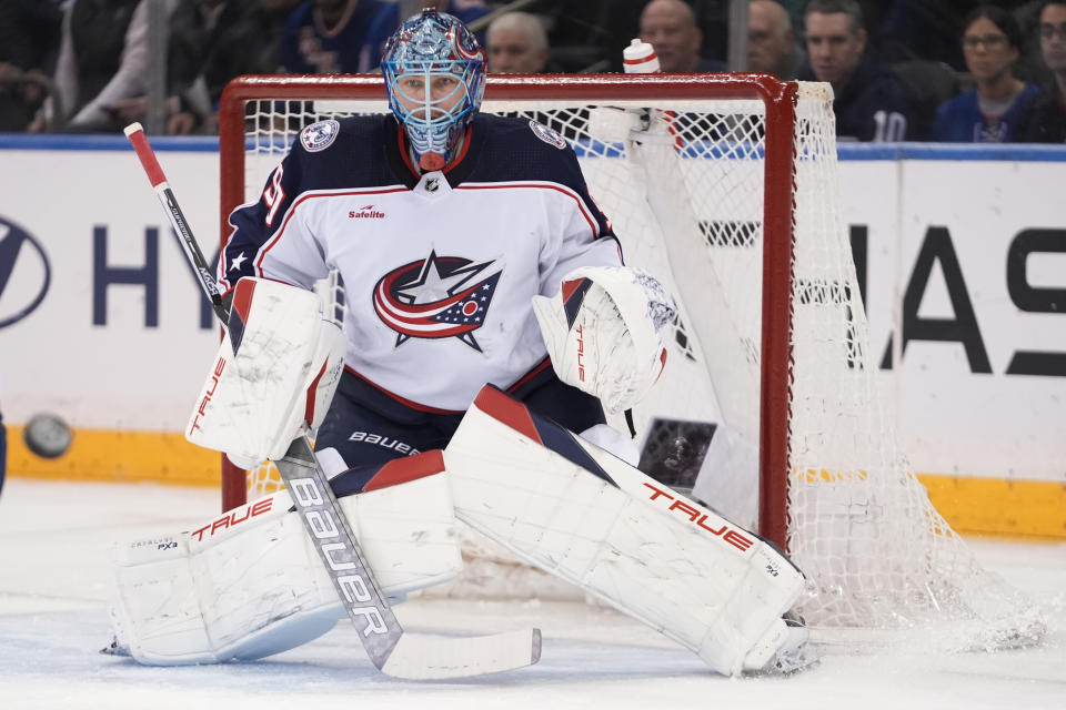 Columbus Blue Jackets goaltender Elvis Merzlikins watches the puck during the first period of the team's NHL hockey game against the New York Rangers on Wednesday, Feb. 28, 2024, in New York. (AP Photo/Frank Franklin II)