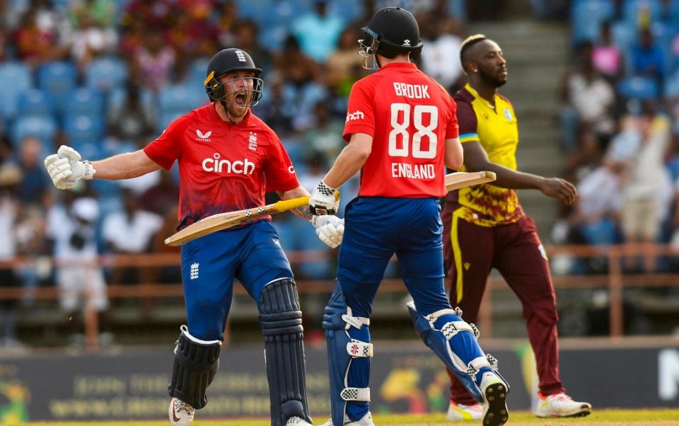 Phil Salt (L) and Harry Brook (R) celebrate/Phil Salt century and Harry Brook cameo power brutal England to stunning victory